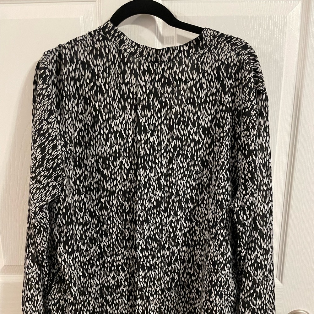 Black and white sheer sleeve blouse.